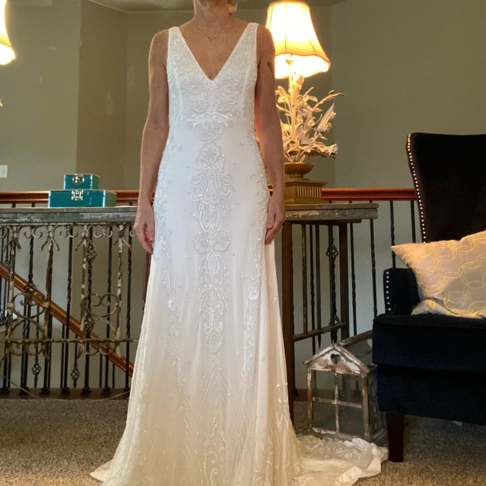 Stunning, heavily beaded wedding dress